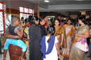 Secretary interacting with parents of Pw.M.Ds