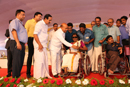 A beneficiary receiving wheel chair from Hon’ble Union Minister.