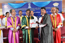 One of the Graduate receiving Degree from the Chief Guest